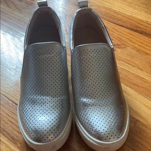 Woman’s silver wedge shoes for everyday